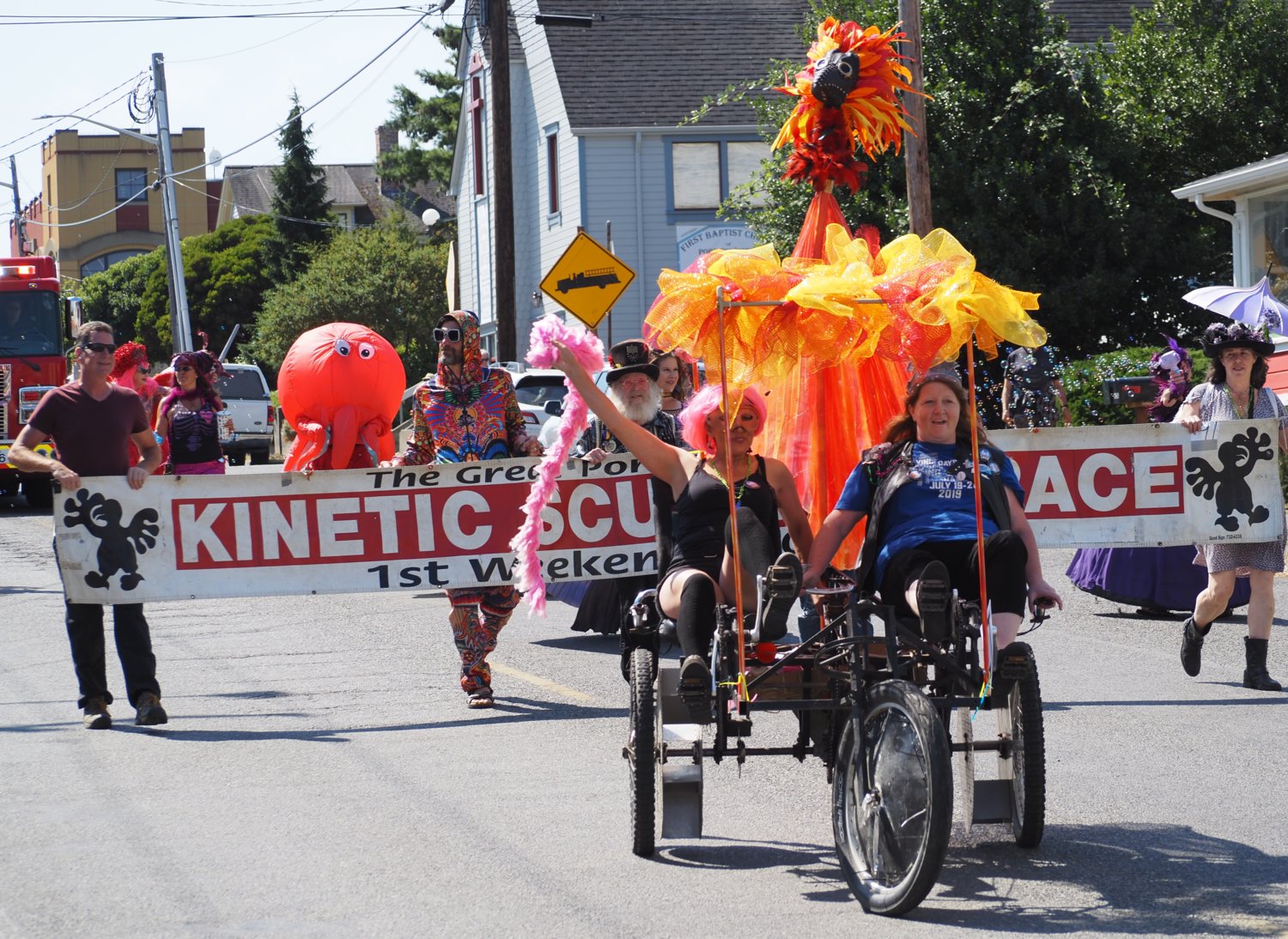 Representatives for the Kinetic Sculpture Race, held the first weekend of October, strut their stuff in the Grandly Local Parade.